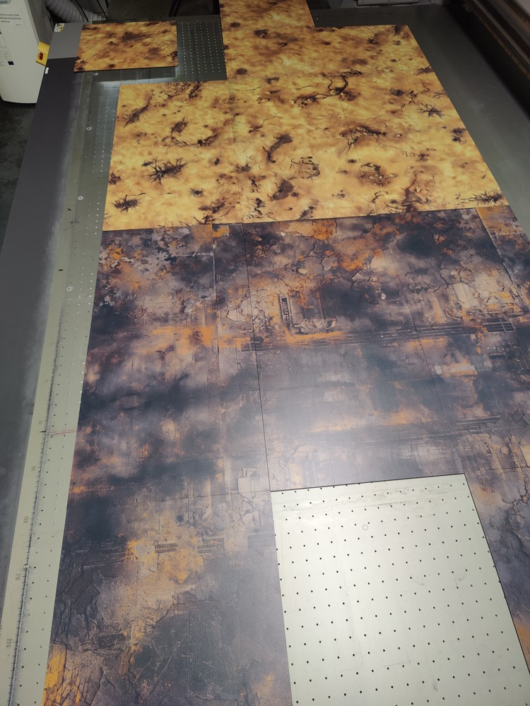 Testing printed rigid gaming mat tiles during production