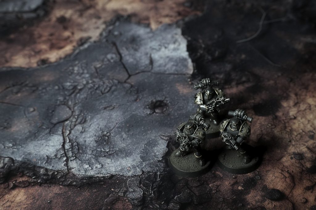 The Burnt Crossings Gaming Mat in use