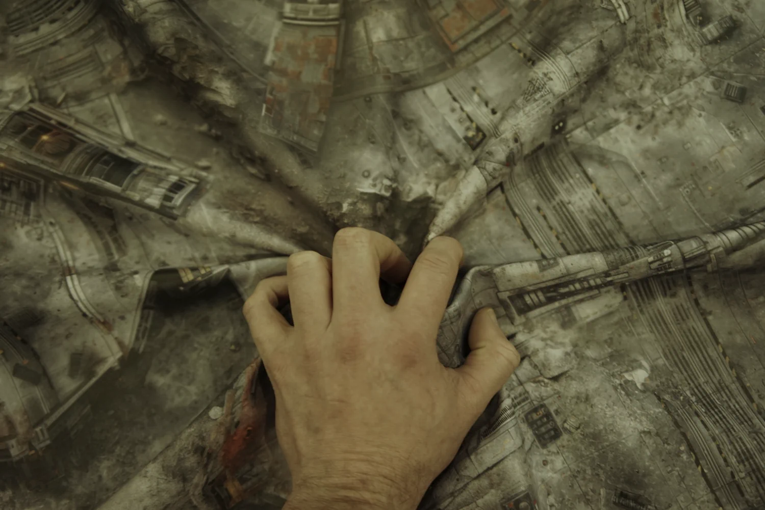 A 2D6 roll-up gaming mat being bent by hand