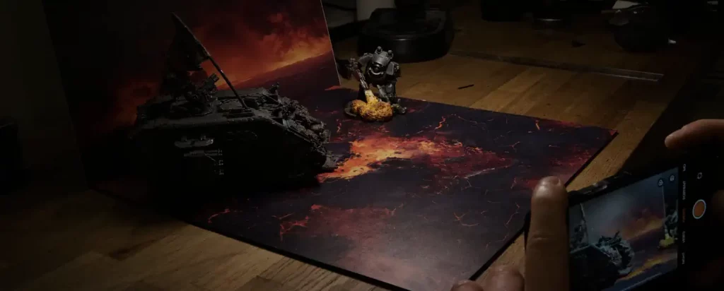 A miniature scene photographed with a 2D6 backdrop